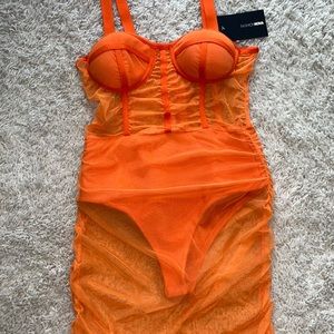 Fashion Nova orange mini dress! Size Large. Never worn, tags still attached